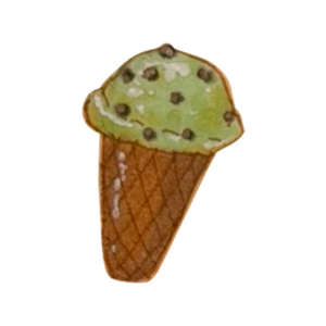 Waffle cone topped with mint chip ice cream