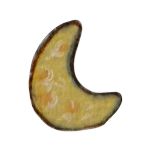 Soft yellow crescent moon